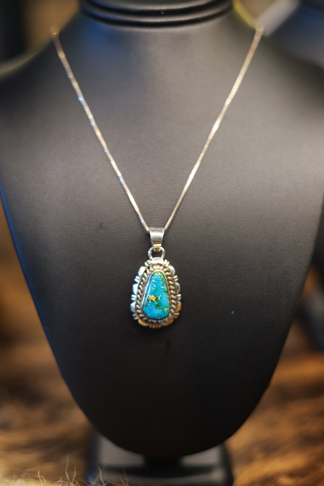 Native American turquoise and silver pendant necklace